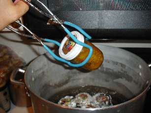 Remove the jars from the canner and allow to cool, undisturbed