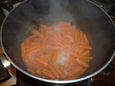 carrots simmering on the stove