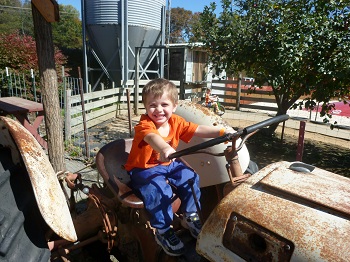 riding one of several tractors