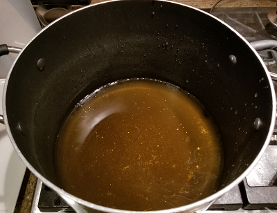 Honeysuckle jelly cooking