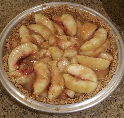 Peach pie with liquids added