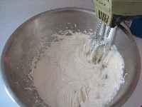mixing bowl, combine the 3 packages of cream cheese, 1 cup of sugar